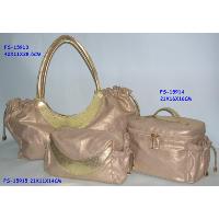 Handbag with vanity and cosmetic bag